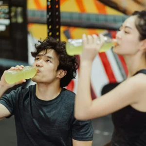 a couple drinking a fibre infused drinks