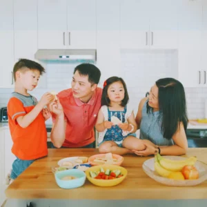family eating a healthy balance meal with high fiber foods