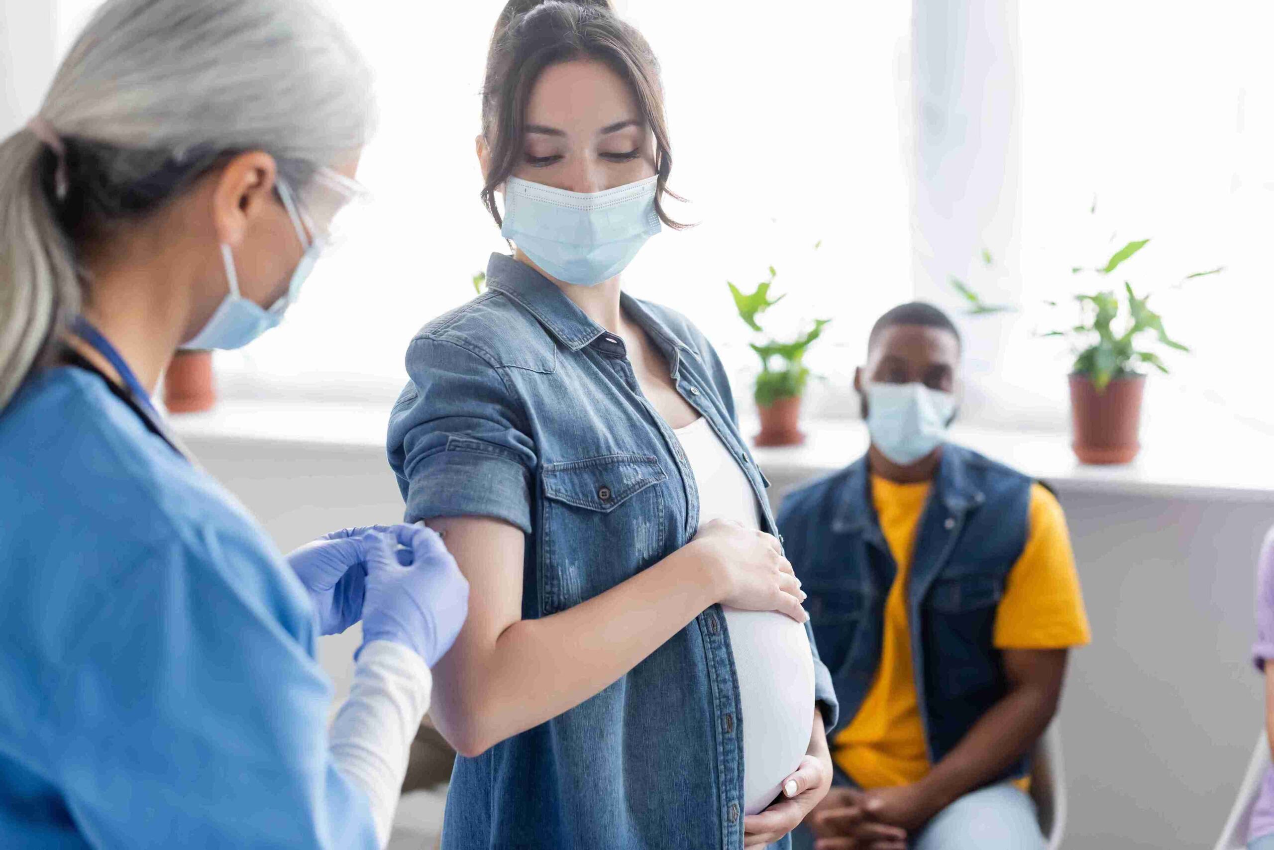 pregnant woman getting vaccinated