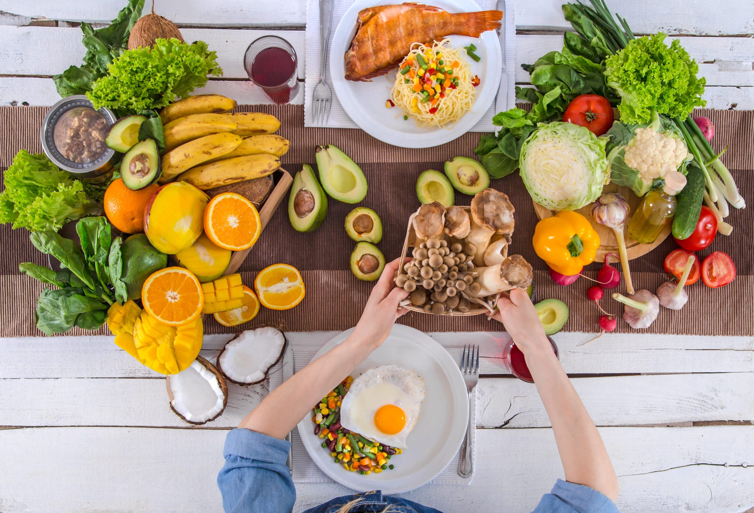 woman at the table preparing nutritious food