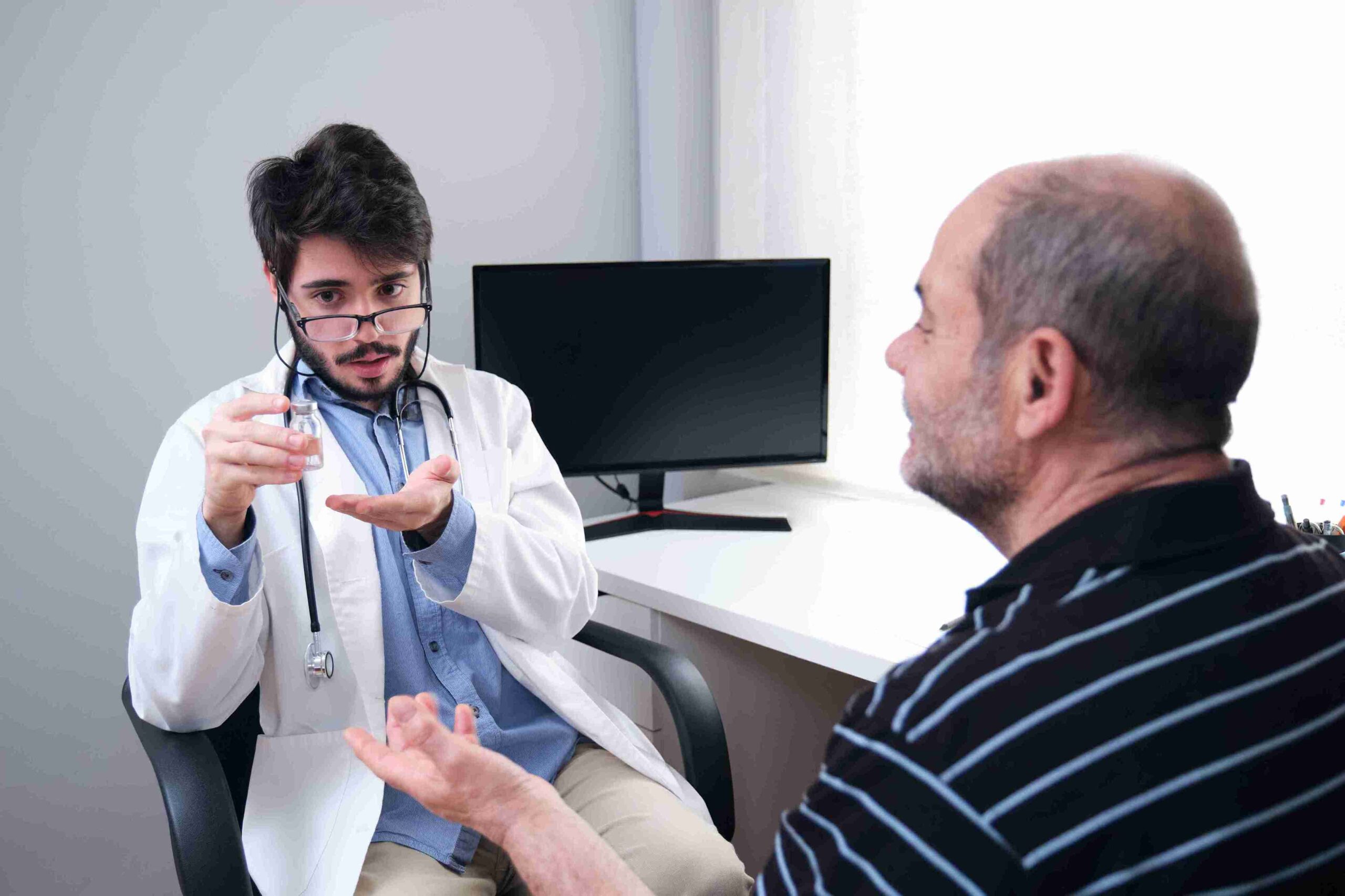 doctor explaining things to an elderly patient