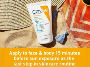 CeraVe sunscreen placed on a beach towel with summer accessories