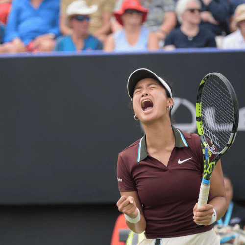 Alexandra Eala celebrates with clenched fists